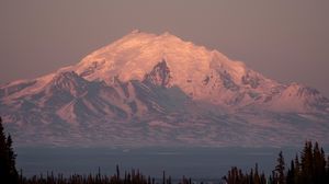Preview wallpaper mountain, peak, road, forest, twilight