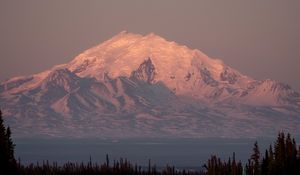 Preview wallpaper mountain, peak, road, forest, twilight