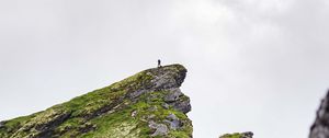 Preview wallpaper mountain, peak, rock, silhouette, loneliness