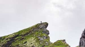 Preview wallpaper mountain, peak, rock, silhouette, loneliness
