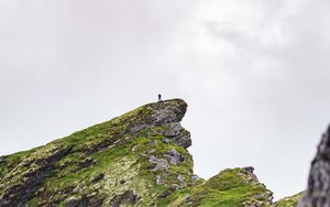 Preview wallpaper mountain, peak, rock, silhouette, loneliness