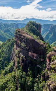 Preview wallpaper mountain, peak, rock, trees, clouds, landscape