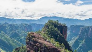 Preview wallpaper mountain, peak, rock, trees, clouds, landscape