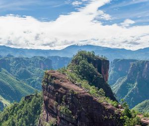 Preview wallpaper mountain, peak, rock, trees, clouds, landscape