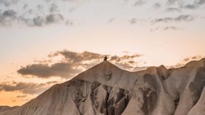 Preview wallpaper mountain, peak, silhouette, man, landscape