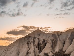 Preview wallpaper mountain, peak, silhouette, man, landscape