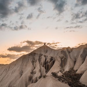 Preview wallpaper mountain, peak, silhouette, man, landscape