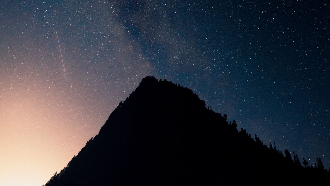 Wallpaper mountain, peak, silhouette, starfall, stars, night