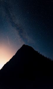 Preview wallpaper mountain, peak, silhouette, starfall, stars, night