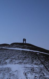 Preview wallpaper mountain, peak, silhouettes, couple, dark