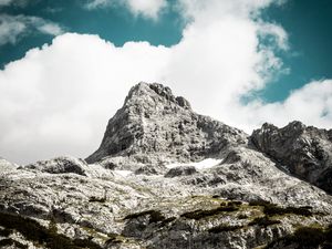 Preview wallpaper mountain, peak, sky, clouds, stones