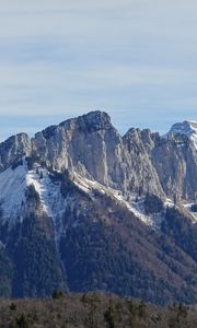 Preview wallpaper mountain, peak, slope, snow, forest, landscape