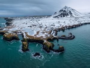 Preview wallpaper mountain, peak, snow, island, sea, nature