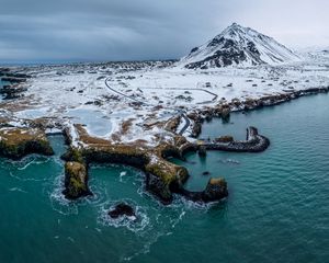 Preview wallpaper mountain, peak, snow, island, sea, nature