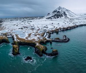 Preview wallpaper mountain, peak, snow, island, sea, nature