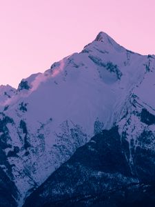 Preview wallpaper mountain, peak, snow, winter, sunset, sky, pink