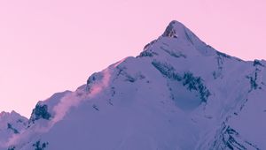 Preview wallpaper mountain, peak, snow, winter, sunset, sky, pink