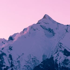 Preview wallpaper mountain, peak, snow, winter, sunset, sky, pink