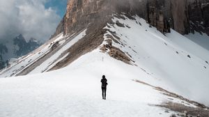 Preview wallpaper mountain, peak, snow, silhouette, human