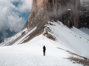 Preview wallpaper mountain, peak, snow, silhouette, human