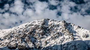 Preview wallpaper mountain, peak, snow, clouds