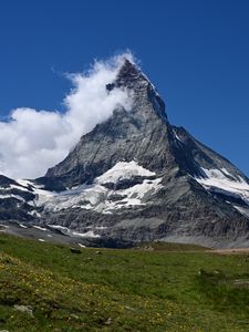 Preview wallpaper mountain, peak, snow, snowy, clouds, grass