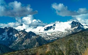 Preview wallpaper mountain, peak, snow, clouds, slope