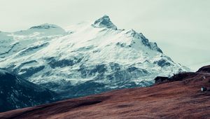 Preview wallpaper mountain, peak, snow, hut, fence