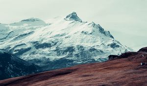 Preview wallpaper mountain, peak, snow, hut, fence