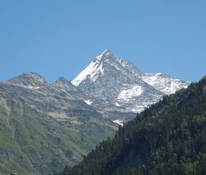 Preview wallpaper mountain, peak, snow, forest, slope