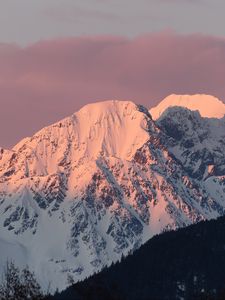 Preview wallpaper mountain, peak, snow, sunset, light