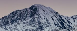 Preview wallpaper mountain, peak, snowy, snow, twilight