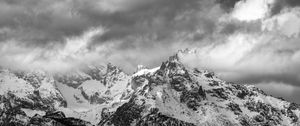 Preview wallpaper mountain, peak, snowy, clouds, fog, snow