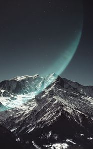 Preview wallpaper mountain, peak, snowy, light, starry sky