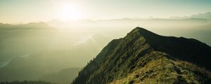 Preview wallpaper mountain, peak, sunlight, fog, grass