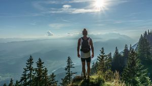 Preview wallpaper mountain, peak, tourist, man, sunlight