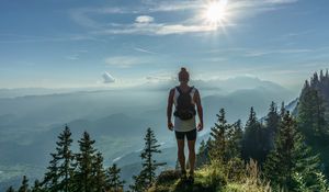 Preview wallpaper mountain, peak, tourist, man, sunlight