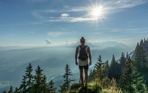 Preview wallpaper mountain, peak, tourist, man, sunlight