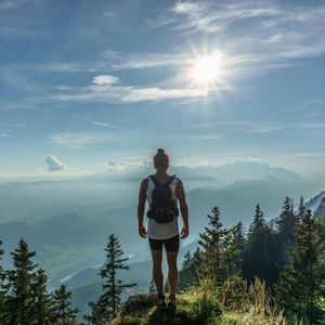 Preview wallpaper mountain, peak, tourist, man, sunlight