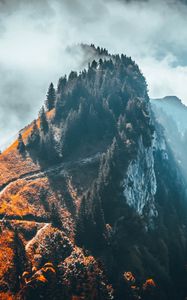 Preview wallpaper mountain, peak, trees, clouds, rock, landscape