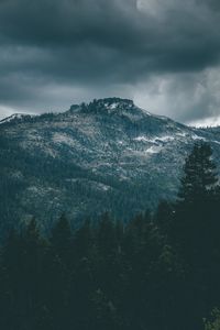 Preview wallpaper mountain, peak, trees, cloudy