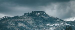 Preview wallpaper mountain, peak, trees, cloudy