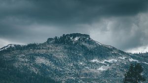 Preview wallpaper mountain, peak, trees, cloudy