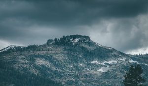 Preview wallpaper mountain, peak, trees, cloudy