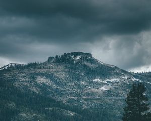Preview wallpaper mountain, peak, trees, cloudy