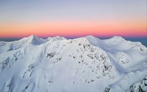 Preview wallpaper mountain, peaks, snowy, horizon, sky, romania