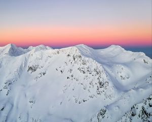 Preview wallpaper mountain, peaks, snowy, horizon, sky, romania