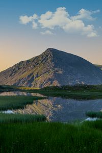 Preview wallpaper mountain, pond, grass, landscape, nature