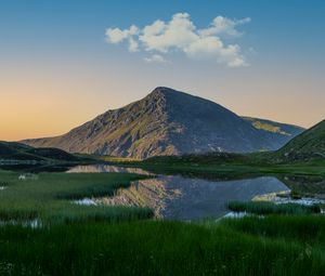 Preview wallpaper mountain, pond, grass, landscape, nature