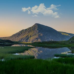 Preview wallpaper mountain, pond, grass, landscape, nature